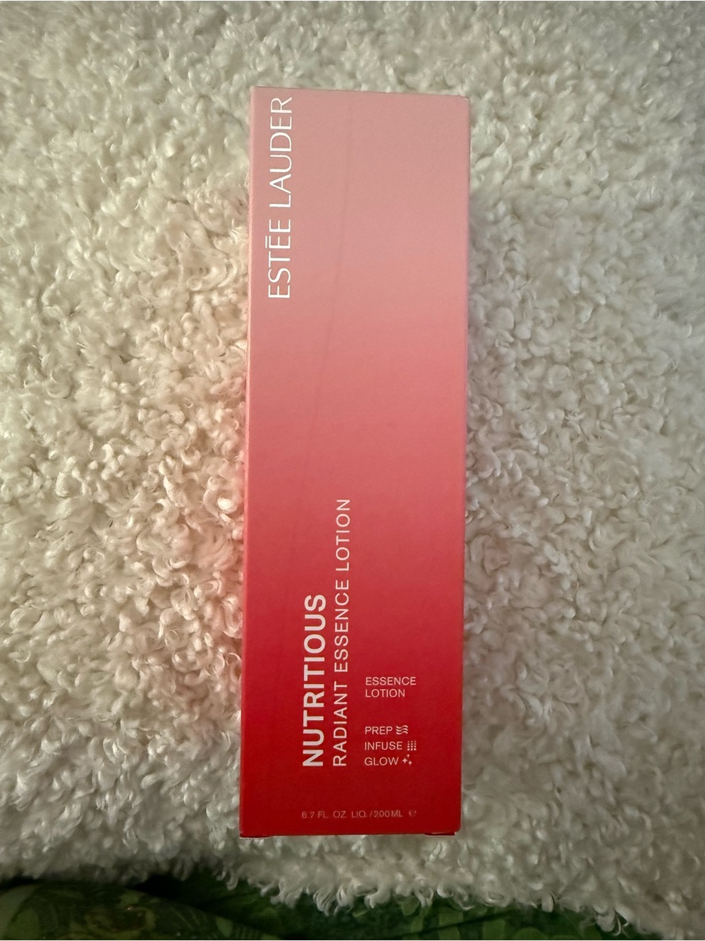 Estée Lauder Nutritious Radiant Essence Lotion - Pink to Red Ombre Box